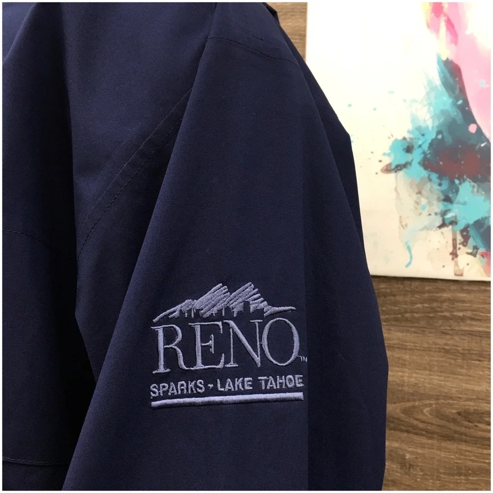 Zero Restriction Gore-Tex Golf Jacket Mens XL Navy Blue Reno Lake Tahoe Logo